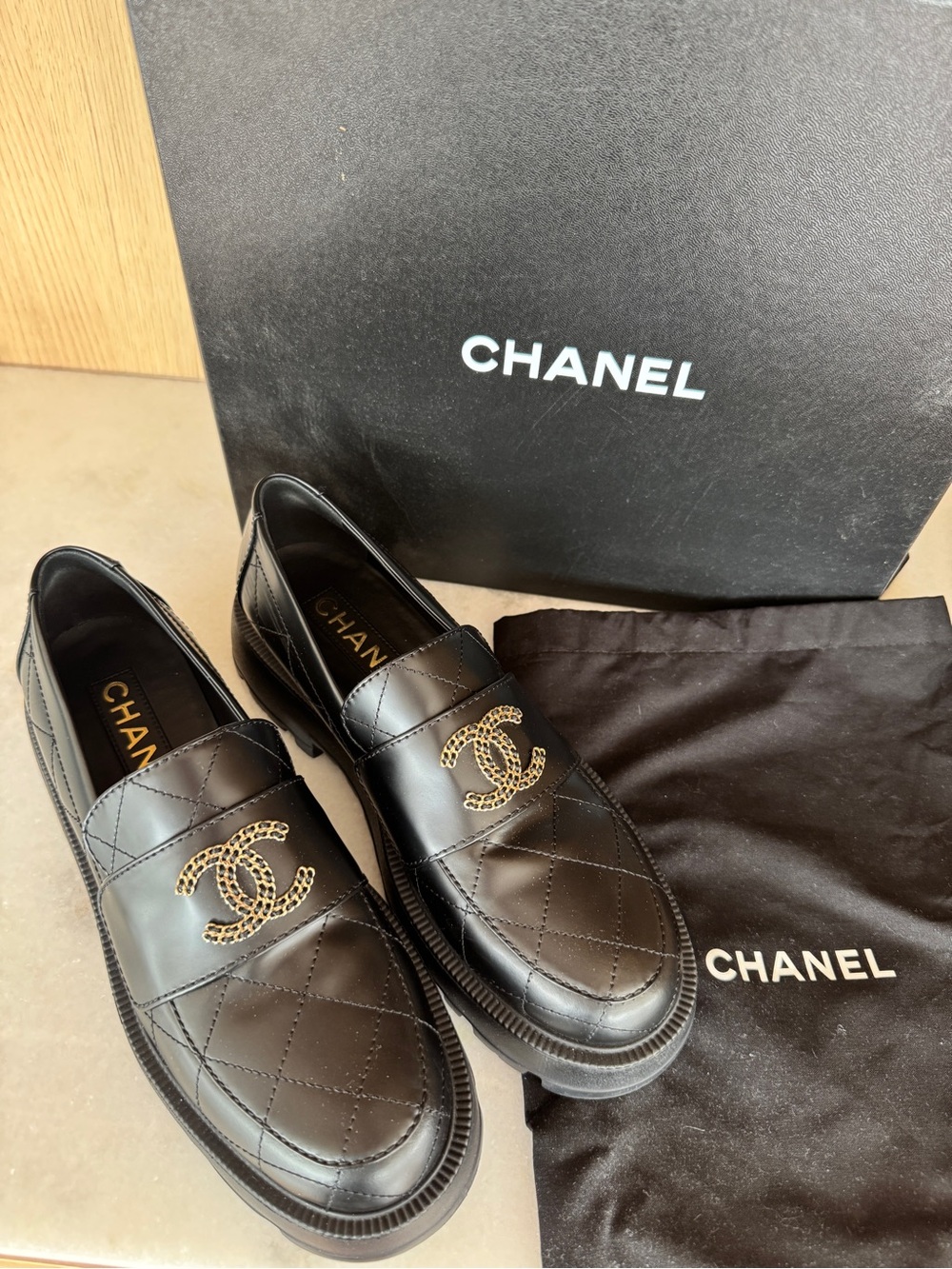CHANEL Black Quilted Leather Loafers with Gold CC Hardware